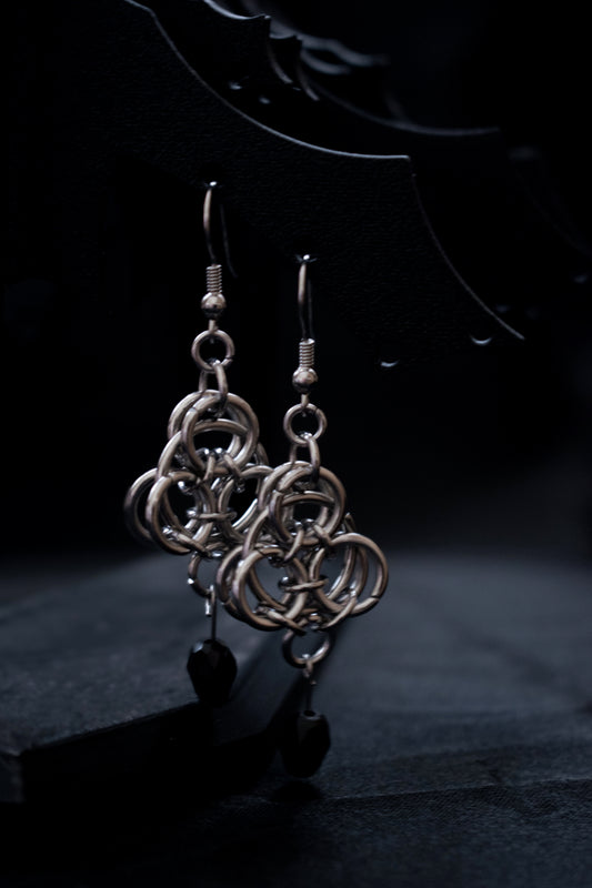 Pendiente ojo oculto